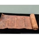 A brown leather Megillah Esther Scroll