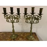 A pair of Lion of Judah brass candelabra