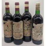 3 bottles of 1983 ChÃ¢teau PhÃ©lan-SÃ©gur, together with a bottle of 1982 Cahors