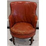 A 19th century leather library chair