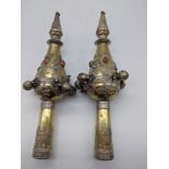 A pair of gilt silver Rimmonim (Torah bells), mounted with bells and turquoise stones, 270g, 20cm