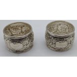 Pair chased napkin rings, 85g