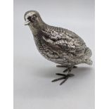 A silver cast model of a quail bird, hallmarked London 1969, maker Edward Barnard & Sons Ltd,