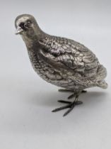 A silver cast model of a quail bird, hallmarked London 1969, maker Edward Barnard & Sons Ltd,