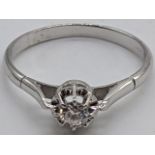 An 18ct white gold and diamond ring, 2g,