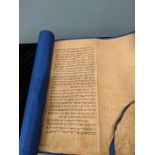 A Sephardi Megillah scroll with a blue backing