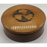 A Japanese Meiji period circular box mounted with 3 stalks, D.19cm