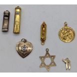 A collection of Jewish pendants, some gold