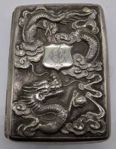 A Chinese export silver card case, late 19th/early 20th century depicting dragons and birds, 80g