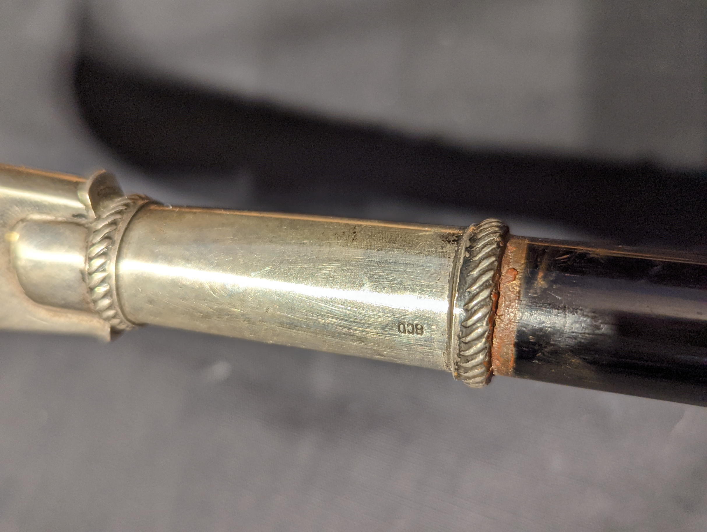 A 19th century Spanish Colonial quirt or whip, woven leather handle, silver covered top, South - Image 4 of 6