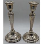 A pair of 20th century silver candlesticks, hallmarked Birmingham, 1963, indistinct maker mark,