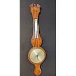 A George III Lione & Somalvico of London mahogany wheel barometer with inlaid shell designs, H.95cm