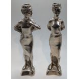 A pair of mid 20th century silver candlesticks in the form of 2 ladies, one having the name Rizel