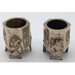 A pair of 19th century Chinese export silver salts with auspicious figurative motifs, probably for