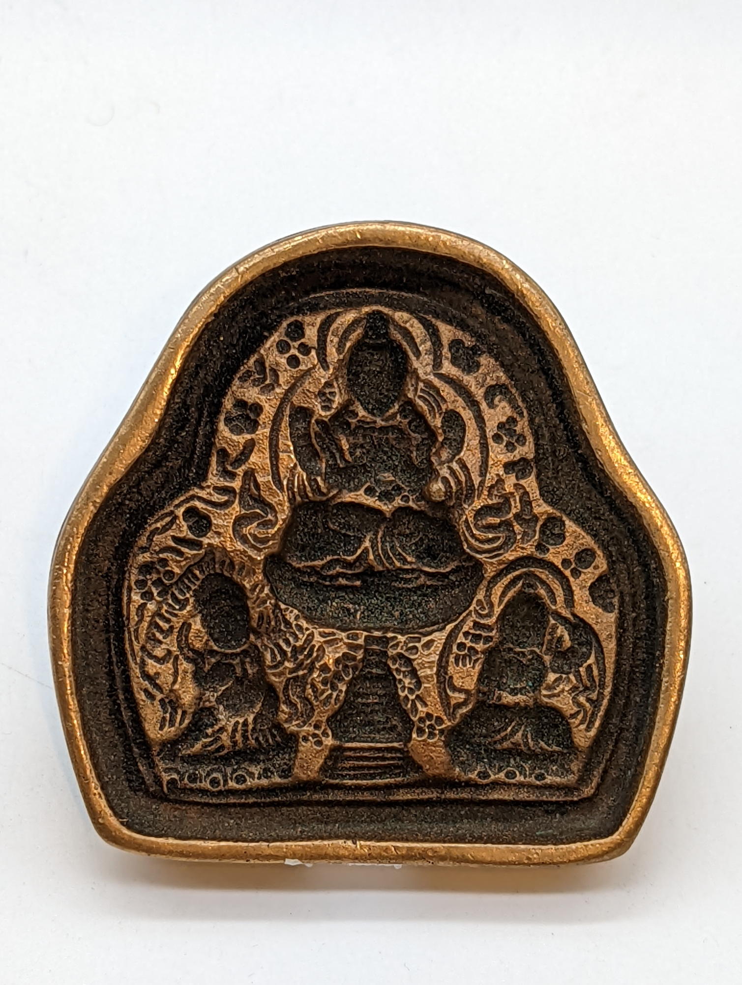 An early 20th century Buddhist brass votive plaque (Tsha Tsha), Tibet, W.8cm - Image 3 of 4