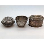 Three 19th century Burmese or Malay Silver Betel Lime Containers, including one in the shape of an