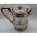 A George III silver coffee pot, hand with oak branch crest, hallmarked London, 1815, indistinct