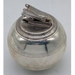 A Witchball by Comyns silver ball table lighter, Colibri lighter, hallmarked London, 1960â€™s, H.7.
