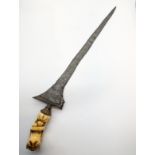 A 16th century Kris Perkaka dagger, iron layered pamour blade, ivory hilt with nickel, Northern