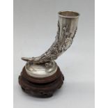 A Chinese export silver cornucopia vase, maker mark WS, raised on hardwood base, total item height