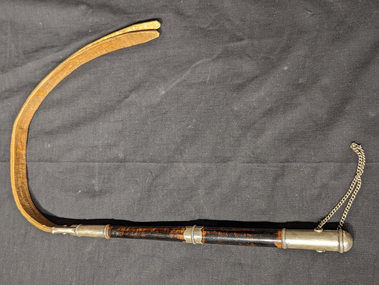 A 19th century Spanish Colonial quirt or whip, woven leather handle, silver covered top, South - Image 3 of 6