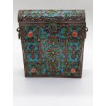 A 19th century Moroccan silver protective amulet box for a Quran / Koran, enamelled and mounted with