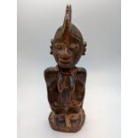 A Yoruba Ere Ibeji Female Twin Figure, possibly Abeokuta, Nigeria, 20th century, H.23cm