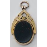 A 9ct gold fob, mounted with bloodstone to one side and carnelian to the other, 6g, H.4cm