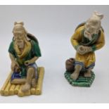 A set of two late 19th/early 20th century Chinese Shiwan ceramic Mudmen figures, H.11cm (tallest),