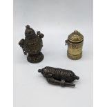 Three brass and bronze containers including a Nepalese chained inkwell, a South Indian lime