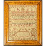 A George IV embroidery sampler, dated 1829, within burr walnut frame, H.33.5cm W.28cm