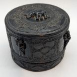 An early 20th century Burmese circular black lacquered betel box, D.11cm