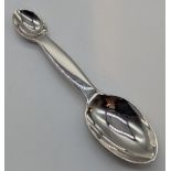 A silver medicine spoon, hallmarked London, 1930-31, maker Francis Higgins & Son Ltd, 30g, L.13cm