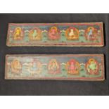 A pair of Tibetan or North Indian Buddhist manuscript covers, mounted with turquoise and coral,