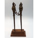 A pair of 19th century Nigerian Yoruba Ogboni Edan Staffs raised on custom wooden base