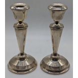 A pair of 20th century silver candlesticks, hallmarked Birmingham, 1963, indistinct maker mark,