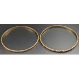 A pair of Moroccan 18ct gold bangles, 29g, D.6.5cm