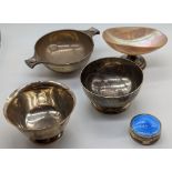 A collection of silver to include a silver quaich, 2 silver bowls, one bowl is Tiffany & Co., a