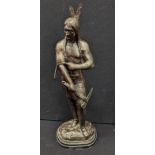 After Remington, a bronze study of a Native American, raised on a marble base, H.53cm