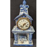 A Delft style French mantel clock, H.40cm