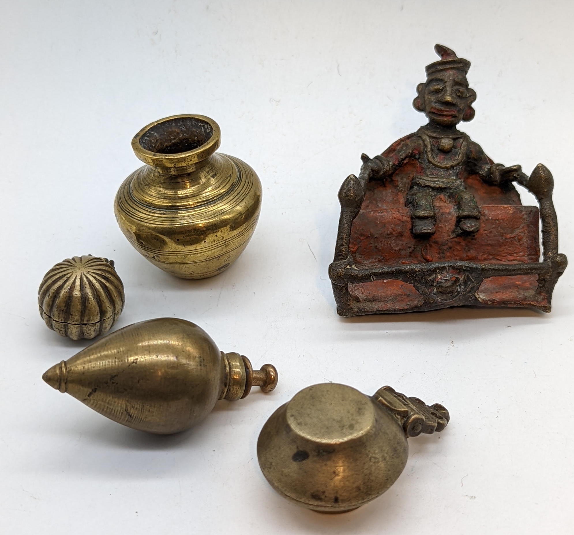 A group of Indian brass objects to include a man seated on a throne and 3 lime containers (5) - Image 2 of 2