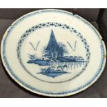An 18th century English Delft blue and white charger, D.35cm