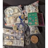A collection of coins and banknotes