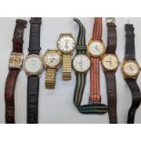 A collection of 8 gents vintage watches