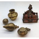 A group of Indian brass objects to include a man seated on a throne and 3 lime containers (5)