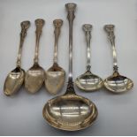 A collection of Victorian Exeter silver cutlery to include a large ladle L.34.5cm, 2 smaller