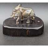 A Patrick Mavros silver sculpture of an elephant, raised on hardwood base, Zimbabwe 1990s,