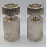 A pair of Gerald Benney silver salt and pepper mills, textured bark finish, hallmarked London,