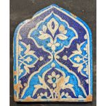 An 18th or 19th century Islamic multan tile, H.25cm