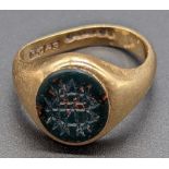 A 9ct gold signet ring with bloodstone monogrammed seal, 6g,